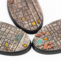 Gros plan sur la texture d'un socle ovale Old City 75×42 mm